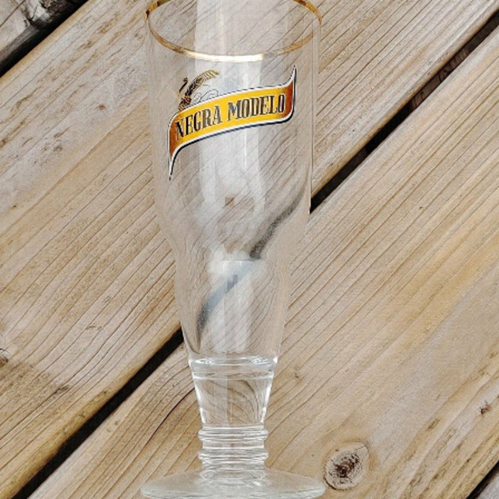 Negra Modelo Drinking Glass Gold Rim Upside Down